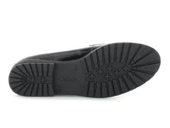 Gabor 72.042.37 - Black patent slip-on loafer with a suede panel on a whit background sole view